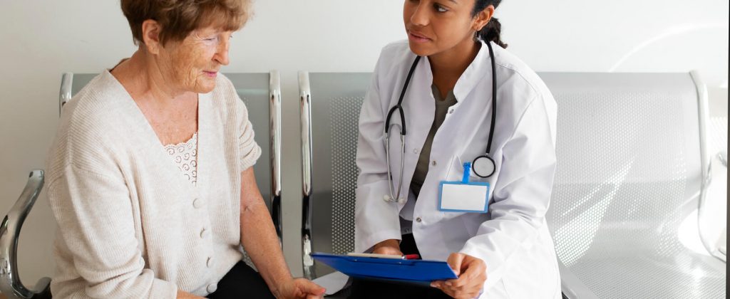doctor-talking-patient-front-view