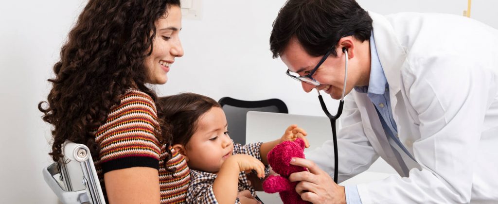 side-view-doctor-checking-baby-boy